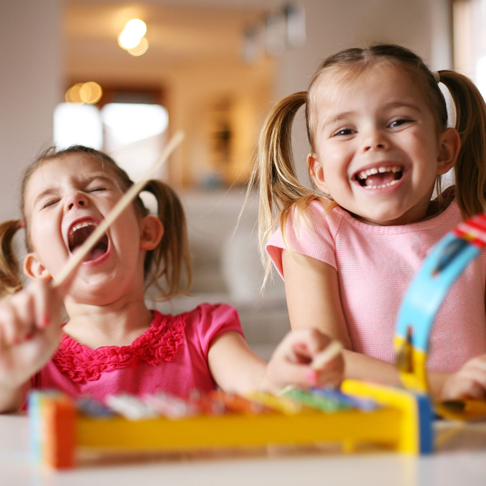 Young Kids Playing a Xylophone